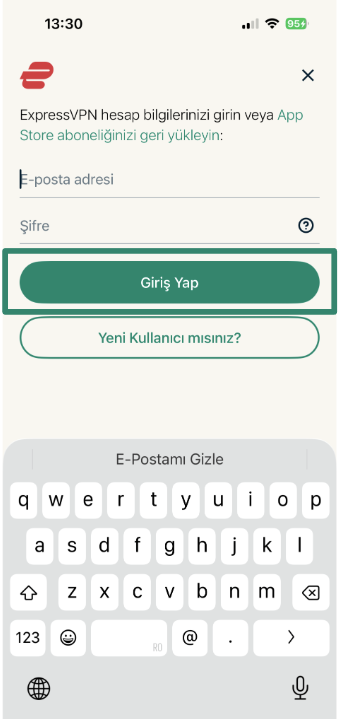 Logging into ExpressVPN using email address and password.