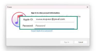  iTunes login window with Apple ID and Password fields displayed and highlighted.